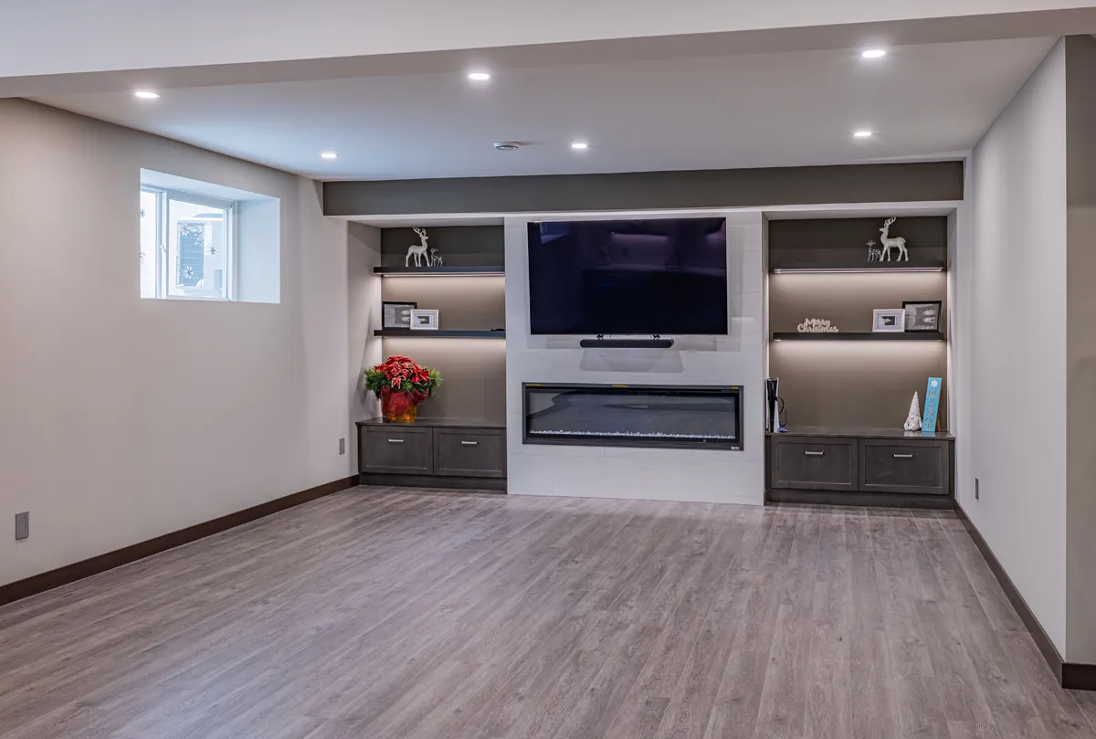 Basement media wall with linear fireplace