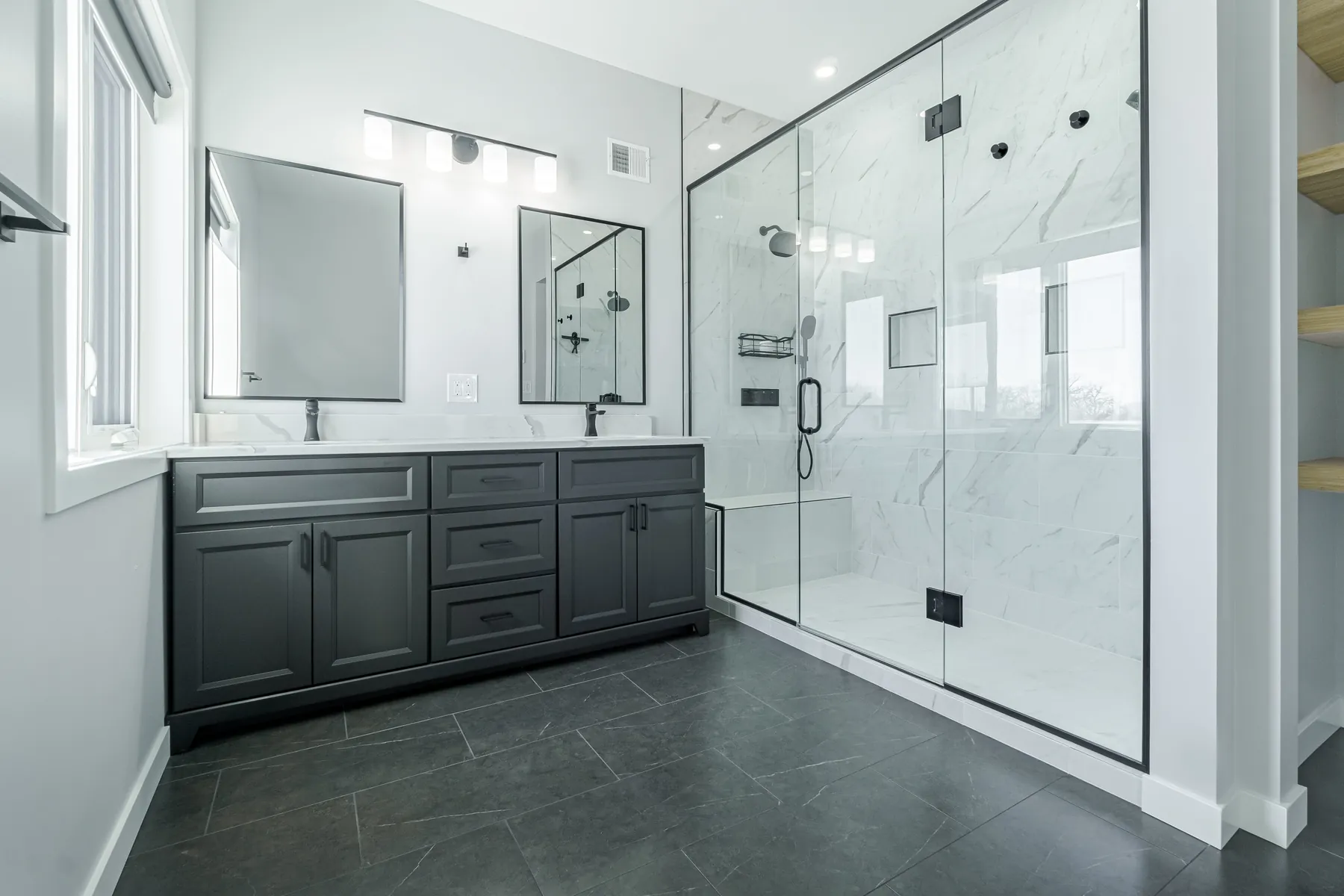 Marble ensuite with double vanity and glass shower